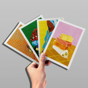 A hand holds four Better World Gift cards representing our Healthy Bodies bundle