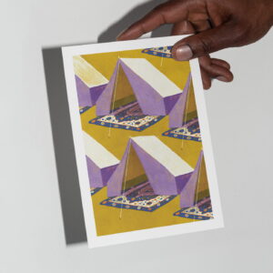 The Emergency Shelter card in hand in front of a grey background