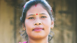 A Nepalese woman looks at the camera
