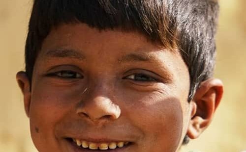 A child smiles