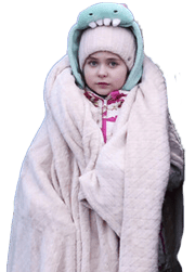A young Ukrainian girl wrapped in a blanket