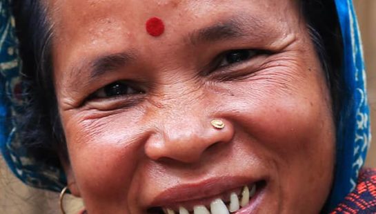A Bangladeshi woman smiles