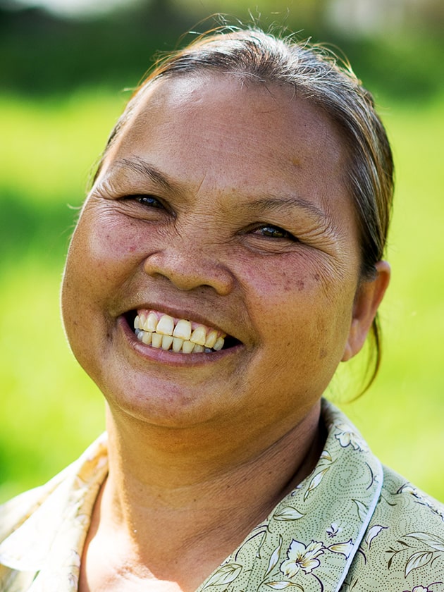 A Cambodian woman smiles brightly