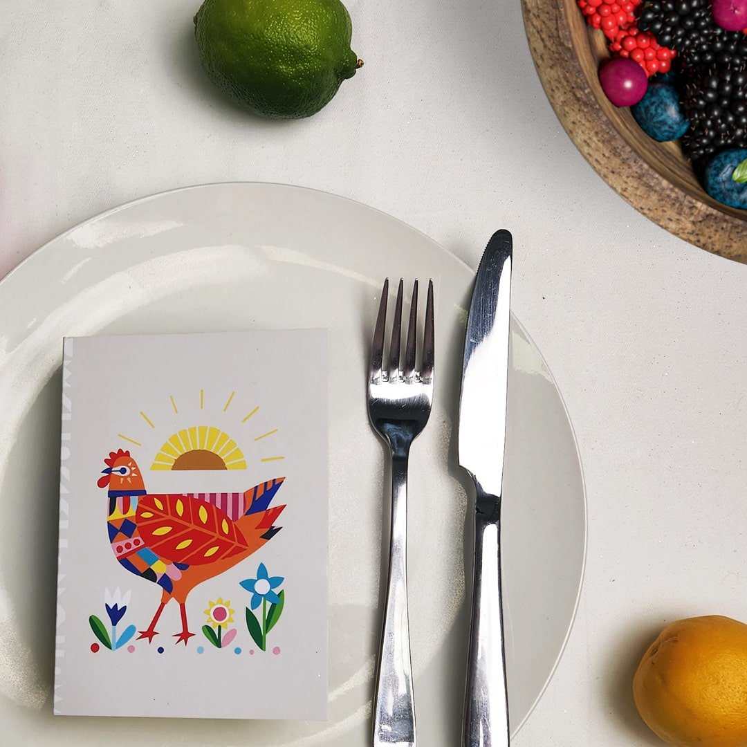 Our Better World chicken gift card on a plate