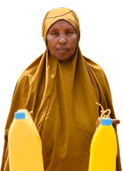 A woman holds containers full of cow's milk