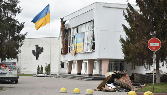 Damaged Building with Ukraine flag
