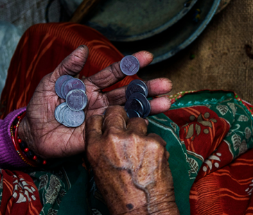Women in Poverty is counting coins