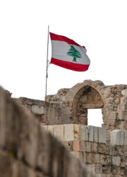 Lebanese flag on top of rock monument