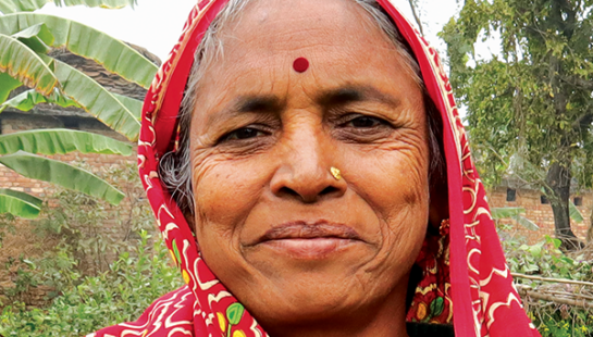 Headshot of Jagmati wearing pink head covering