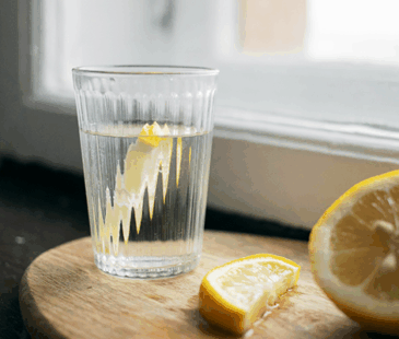 Glass of water with a slice of lemon