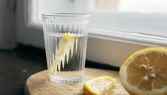 Glass of water with a slice of lemon