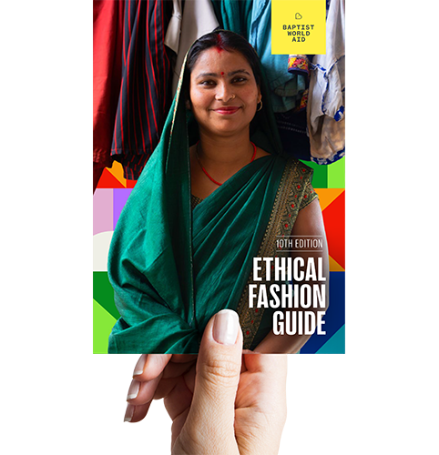 Hand holding Ethical Fashion Guide